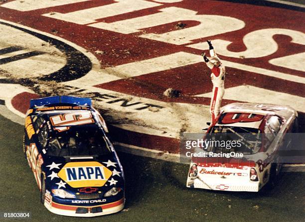 Dale Earnhardt Jr. Claims his first victory at Daytona in the Pepsi 400, 2001. Teammate Michael Waltrip joined him on the infield grass. It was 11...