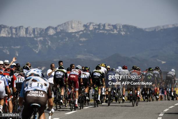 The pack rides during the 165 km sixteenth stage of the 104th edition of the Tour de France cycling race on July 18, 2017 between Le Puy-en-Velay and...