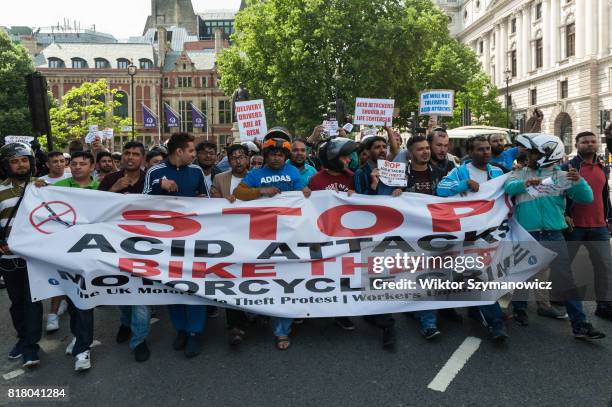 Hundreds of motorcycle drivers gather in Parliament Square in central London to protest against acid attacks and motorcycle theft on July 18, 2017 in...