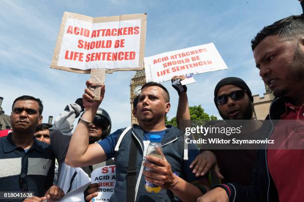 Hundreds of motorcycle drivers gather in Parliament Square in central London to protest against acid attacks and motorcycle theft on July 18, 2017 in...