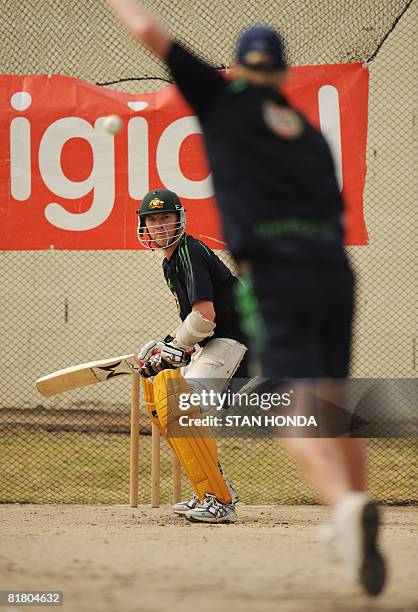 Australian cricketer Brett Lee waits for a ball during practice session on July 2, 2008 at Warner Park in Basseterre in advance of the One-Day...