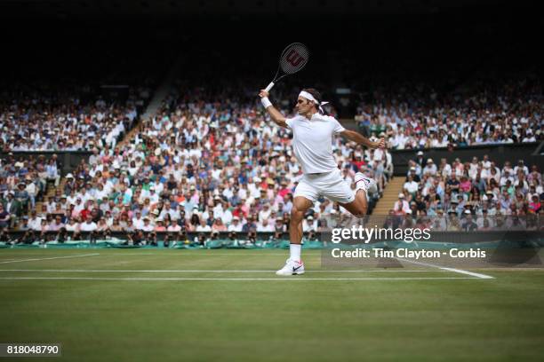 Roger Federer of Switzerland in action against Marin Cilic of Croatia during the Gentlemen's Singles final of the Wimbledon Lawn Tennis Championships...