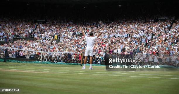 Roger Federer of Switzerland celebrates victory over Marin Cilic of Croatia in the Gentlemen's Singles final of the Wimbledon Lawn Tennis...