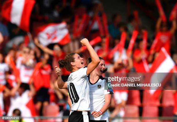 Austria's Nina Burger celebrates with her teammate Sarah Zadrazil after scoring a goal against of Switzerland during the UEFA Womens Euro 2017...