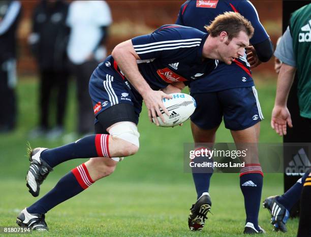 Ali Williams runs with the ball during a New Zealand All Blacks training session at Rugby League Park on July 3, 2008 in Wellington, New Zealand.