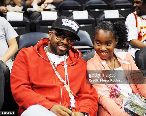 Producer/Rapper Jermaine Dupri and his Daughter attends the Boston Celtics vs Atlanta Hawks Playoff Game on April 26, 2008 in Atlanta.