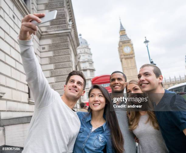 group of students taking a selfie in london - big ben selfie stock pictures, royalty-free photos & images