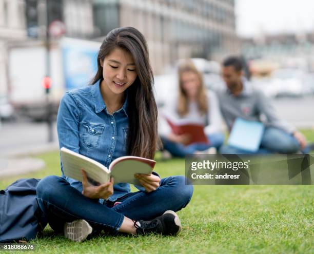 portrait of an asian student studying outdoors - study abroad stock pictures, royalty-free photos & images