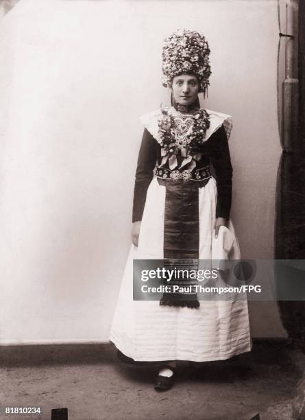 Girl from Scheessel in Lower Saxony wearing her wedding costume, circa 1900.