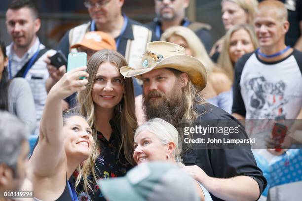 Singers Morgane Stapleton and Chris Stapleton pose for a selfie with fans on NBC's "Today" at Rockefeller Plaza on July 18, 2017 in New York City.
