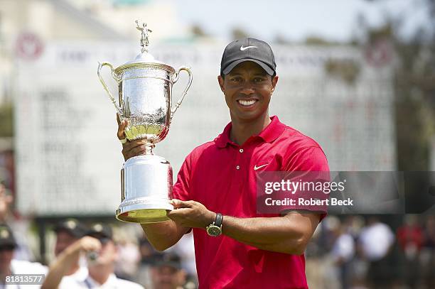 Closeup of Tiger Woods victorious with trophy after winning Monday playoff round vs Rocco Mediate at Torrey Pines GC. La Jolla, CA 6/16/2008 CREDIT:...