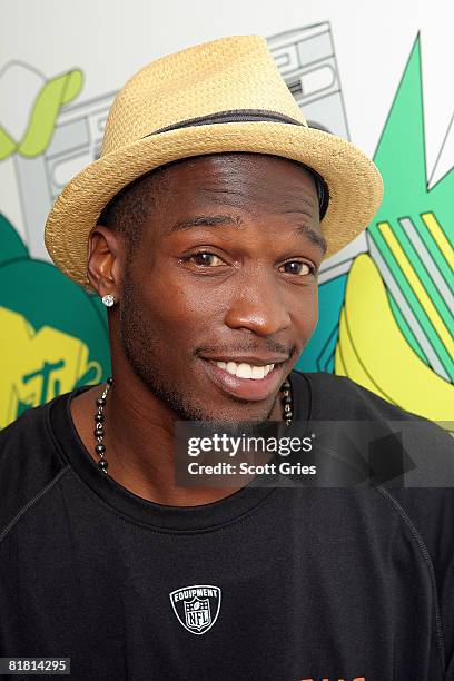 Professional football player Chad Johnson poses for a photo backstage during MTV's Total Request Live at the MTV Times Square Studios July 1, 2008 in...