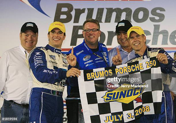 Team owner Chip Ganassi, Memo Rojas, Brad Parrott, Felix Sabates, Scott Pruett of the TELMEX Chip Ganassi Lexus Riley, celebrate in victory lane...