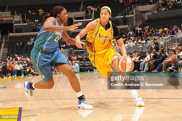 Candace Parker of the Los Angeles Sparks drives against Nicky Anosike of the Minnesota Lynx during the game on July 3, 2008 at Staples Center in Los...
