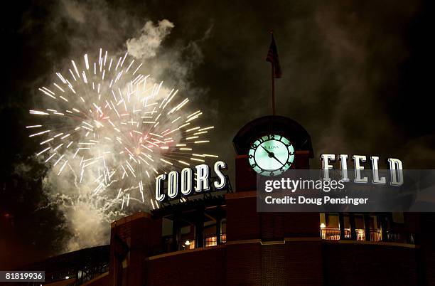 Fireworks explode over Coors Field in celebration of the Fourth of July after the Colorado Rockies defeated the Florida Marlins 6-5 in 11 innings at...