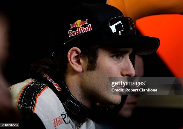 Rick Kelly of the HSV Dealer Team watches the timing screens during practice for round six of the V8 Supercars Championship Series at Hidden Valley...