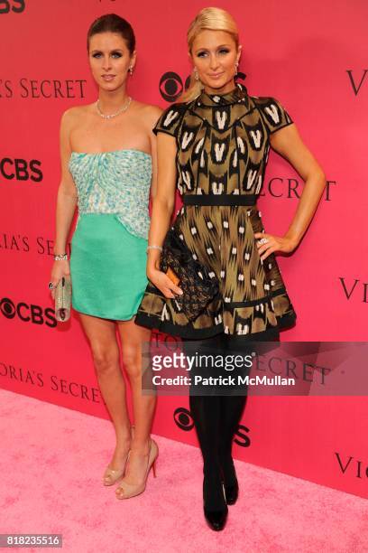 Nikki Hilton and Paris Hilton attend VICTORIA'S SECRET Fashion Show 2010 Arrivals at Lexington Armory on November 10th, 2010 in New York City.