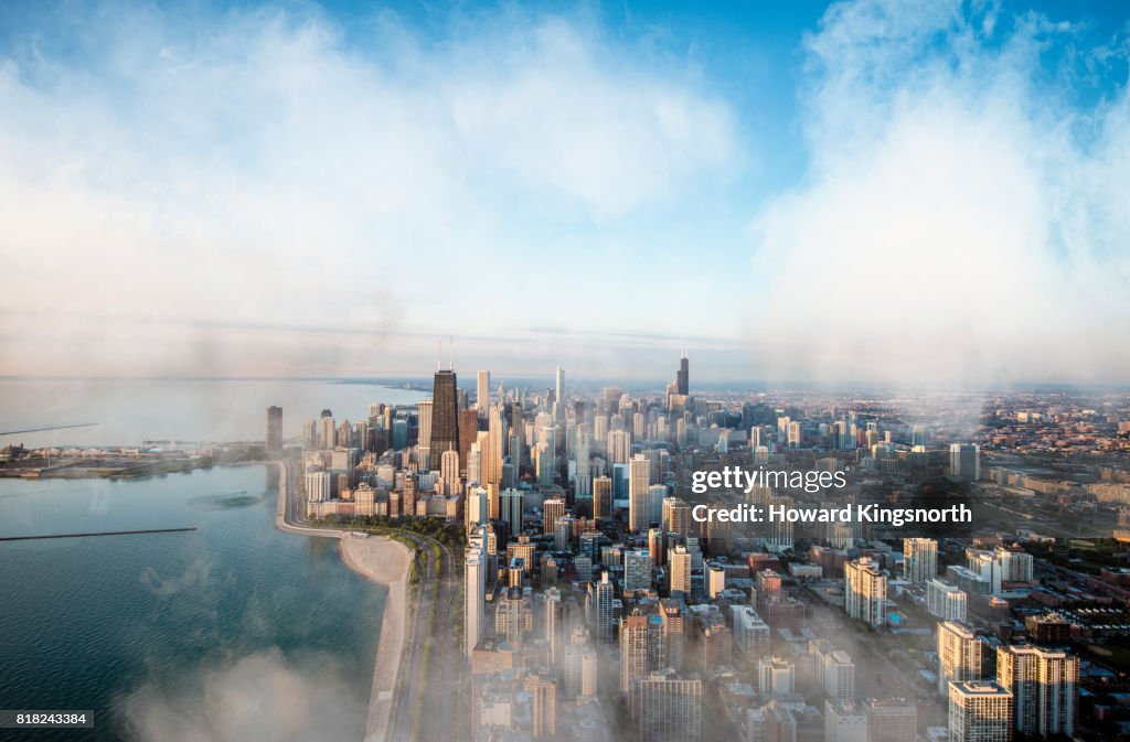 Aerial view of Chicago waterfront with misty sky