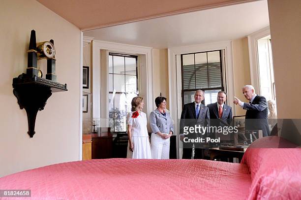 President George W. Bush , Virginia Governor Tim Kaine and Kaine's wife Anne Holton are given a tour of Thomas Jefferson's home by Dan Jordan ,...