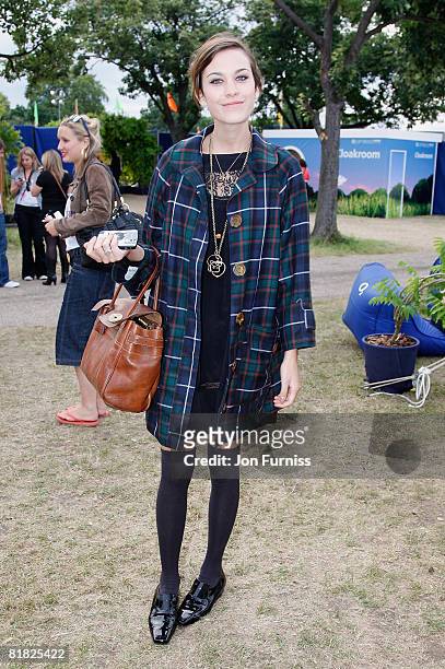 Presenter Alexa Chung poses behind the main stage in the O2 VIP Lounge during Day Two of the O2 Wireless Festival in Hyde Park on July 4, 2008 in...