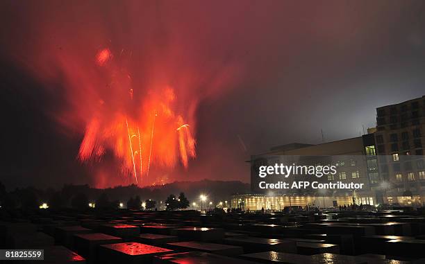 Fireworks explode during a ceremony to inaugurate the new US embassy building in Berlin on July 4, 2008 . Former president George H.W. Bush, who was...