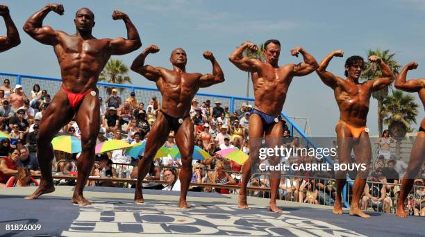 Bodybuilders compete during the "Mr. And Mrs. Muscle Beach" event on July 4, 2008 in Venice Beach, California. Fun and fitness have long been the...