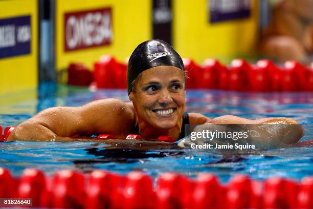 Dara Torres smiles after winning the final of the 100 meter freestyle and qualifying for her fifth Olympic team during the U.S. Swimming Olympic...