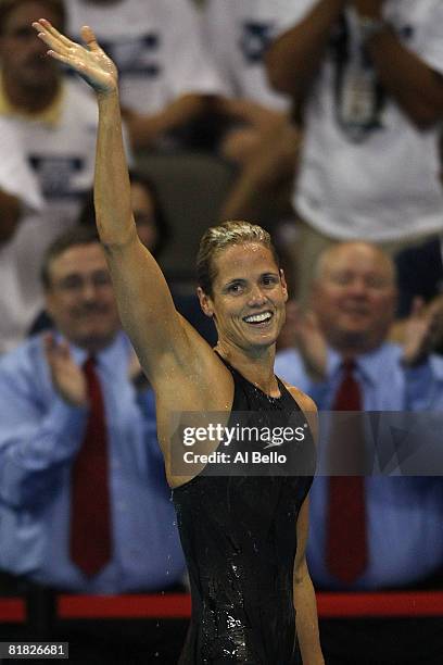 Dara Torres waves to the crowd after winning the final of the 100 meter freestyle and qualifying for her fifth Olympic team during the U.S. Swimming...