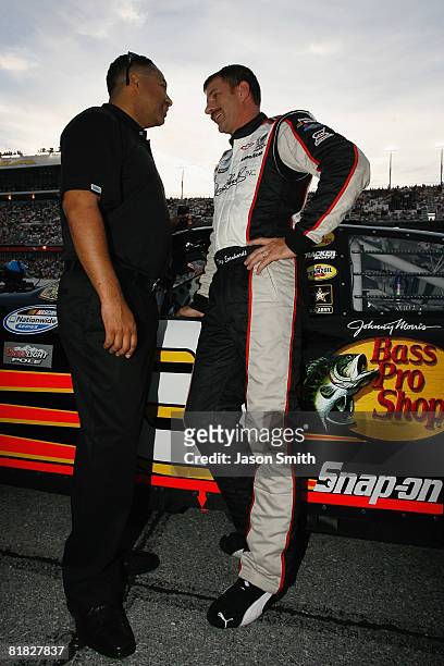 Max Siegel president of global operations for Dale Earnhardt Inc., speaks with Kerry Earnhardt , driver of the Bass Pro Shops/Tracker Boats, prior to...