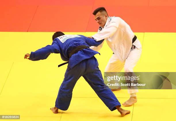 Uros Nikolic of Australia competes against Soni of India in the Boys -73 kg judo final on day 1 of the 2017 Youth Commonwealth Games at Kendal G L...