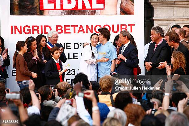 Freed hostage Ingrid Betancourt hugs her children Lorenzo Betancourt and Melanie Betancourt at the hotel de ville on July 4, 2008 in Paris, France....