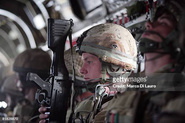British Paratroopers from the 3rd Battalion Parachute Regiment fly from their base at the Kandahar Air Field as they deploy during an operation to...