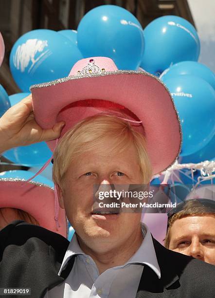 London Mayor Boris Johnson wears a pink stetson hat at the Gay Pride parade on July 5, 2008 in London, England. The parade consists of celebrities,...