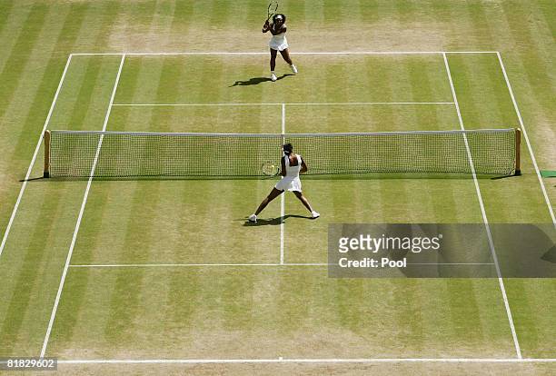 Serena Williams of United States plays a shot during the women's singles Final match against Venus Williams of United States on day twelve of the...