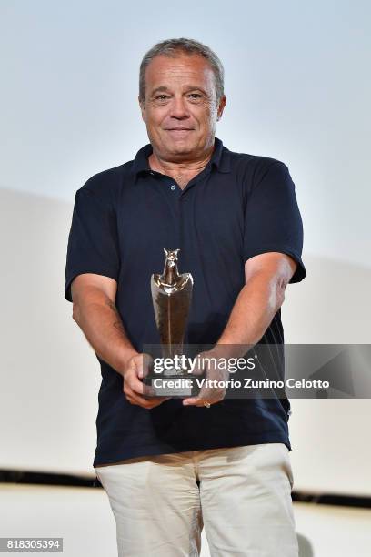Claudio Amendola poses with the Giffoni Award during Giffoni Film Festival 2017 Day 5 on July 18, 2017 in Giffoni Valle Piana, Italy.