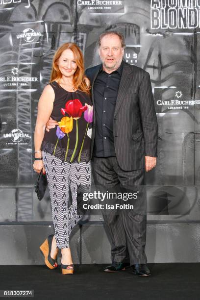 Musician Harold Faltermeyer and his partner Birgit attend the 'Atomic Blonde' World Premiere at Stage Theater on July 17, 2017 in Berlin, Germany.