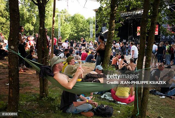 People attend the 20th edition of the French rock festival "Les eurockeennes de Belfort", on July 05, 2008 in Belfort, eastern France. The music...