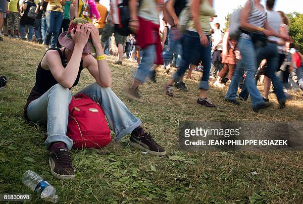 People attend the 20th edition of the French rock festival "Les eurockeennes de Belfort", on July 05, 2008 in Belfort, eastern France. The music...
