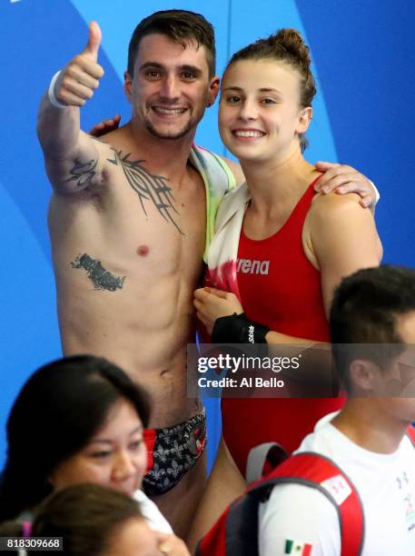 Laura Marino and Mattieu Rosset of France celebrate winning the gold medal during the Mixed Diving Team final on day five of the Budapest 2017 FINA...