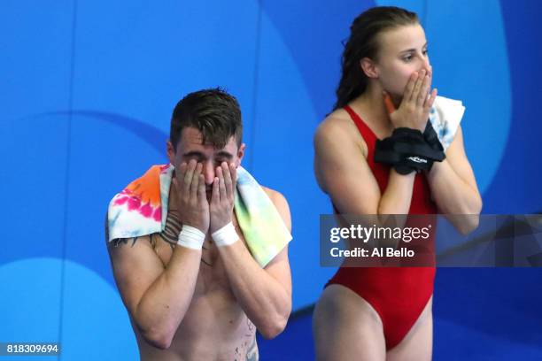 Laura Marino and Mattieu Rosset of France celebrate winning the gold medal during the Mixed Diving Team final on day five of the Budapest 2017 FINA...