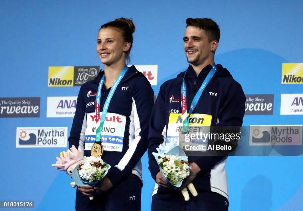 Gold medalists Laura Marino and Mattieu Rosset of France pose with the medals won during the Mixed Diving Team final on day five of the Budapest 2017...