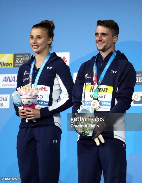 Gold medalists Laura Marino and Mattieu Rosset of France pose with the medals won during the Mixed Diving Team final on day five of the Budapest 2017...