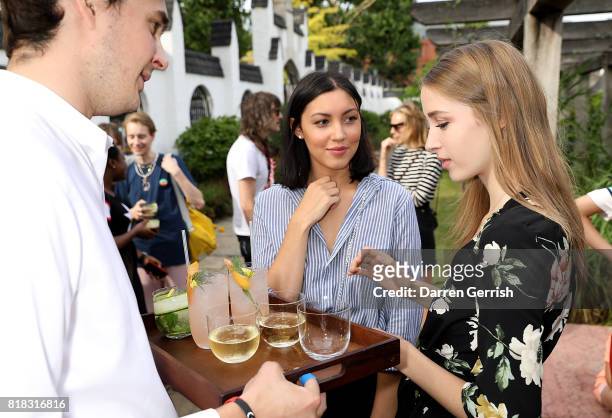 Gabrielle Sanchez and Georgia Howarth attend the J Brand x Bella Freud garden tea party on July 18, 2017 in London, England.