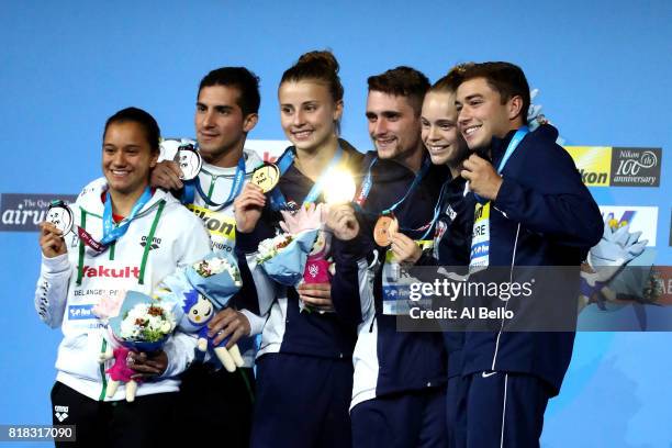 Silver medalists Viviana Del Angel Peniche and Rommel Pacheco Marrufo of Mexico, gold medalists Laura Marino and Mattieu Rosset of France and bronze...