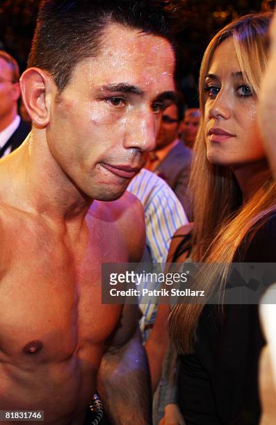 Felix Sturm of Germany and his wife Jasmin Catic, look on after the WBA middleweight world championship fight against Randy Griffin of United States...