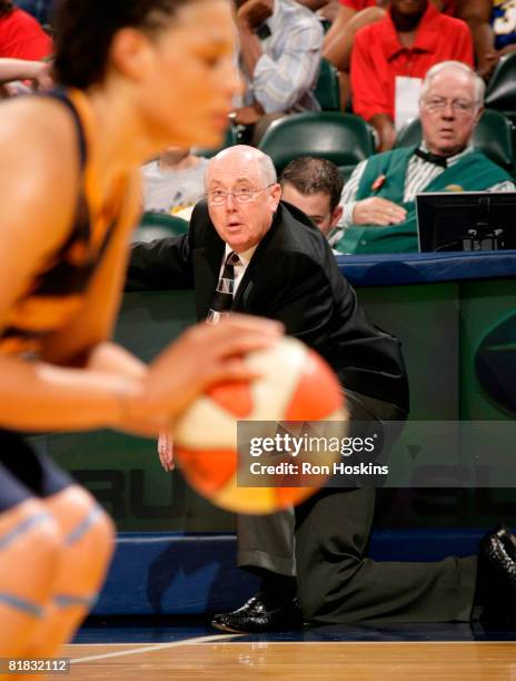 Connecticut Sun head coach, Mike Thibault, watches as Tamika Whitmore of the Sun shoots a free throw against the Indiana Fever at Conseco Fieldhouse...