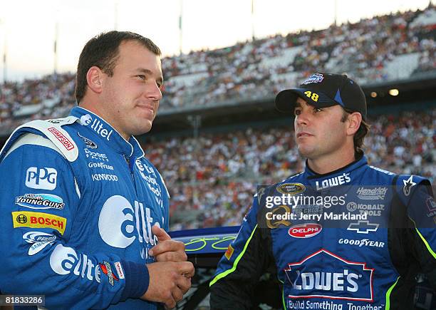 Ryan Newman, driver of the alltel/Samsung Dodge talks with Jimmie Johnson, driver of the Lowe's Chevrolet during pre-race for the NASCAR Sprint Cup...