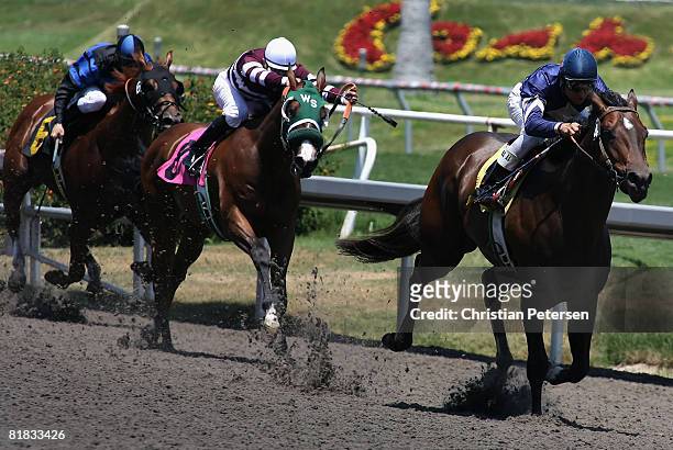 Tyler Baze , riding Mind the Minister, leads Richard Migilore, riding Lightning Hit, and Alex Solis, riding Tycoon Doby, in the 4th race of the 2008...