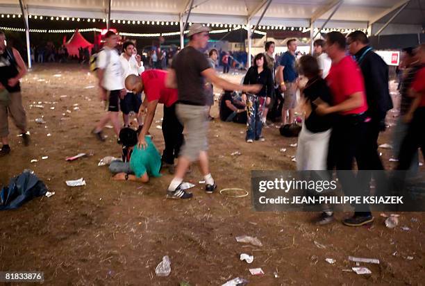 People attend the 20th edition of the French rock festival "Les Eurockeennes de Belfort", on July 5, 2008 in Belfort, eastern France. The festival...