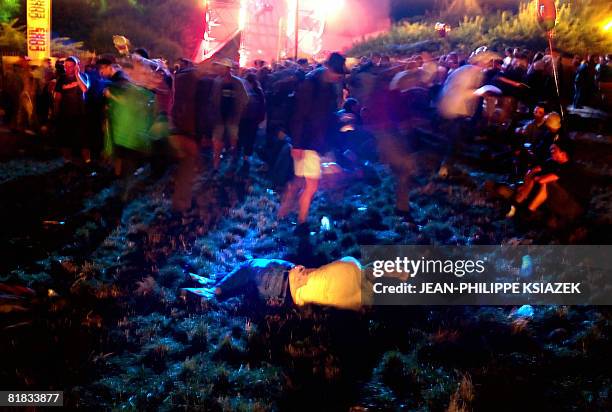 People attend the 20th edition of the French rock festival "Les Eurockeennes de Belfort", on July 5, 2008 in Belfort, eastern France. The festival...